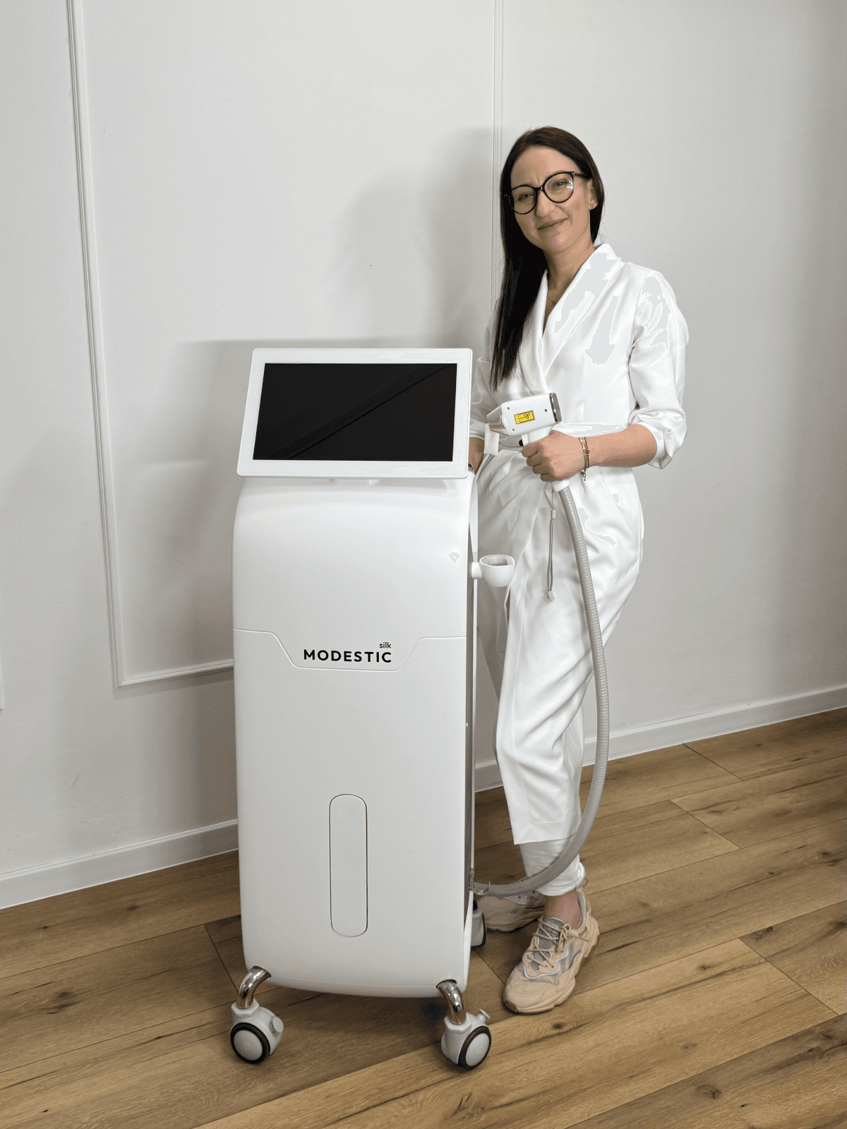 Clinic team with the Modestic Silk laser